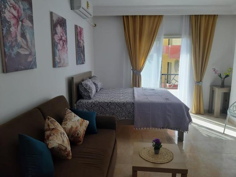 Llit o llits en una habitació de Exoticky apartman