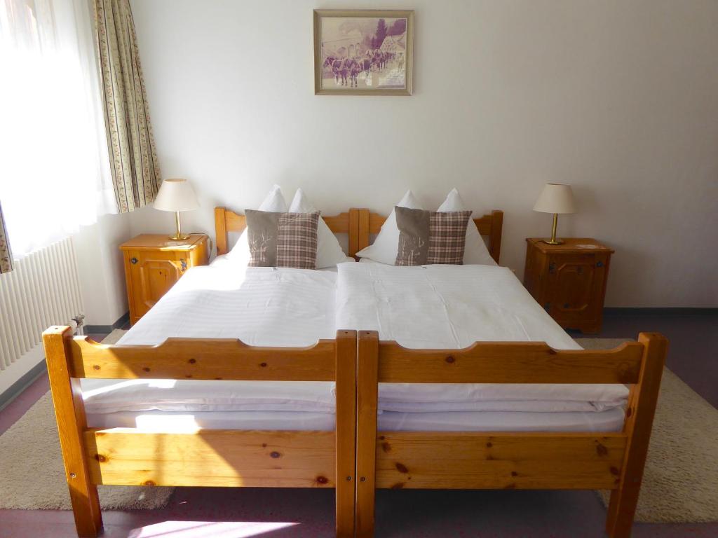 Letto o letti in una camera di Hotel Roseg-Gletscher