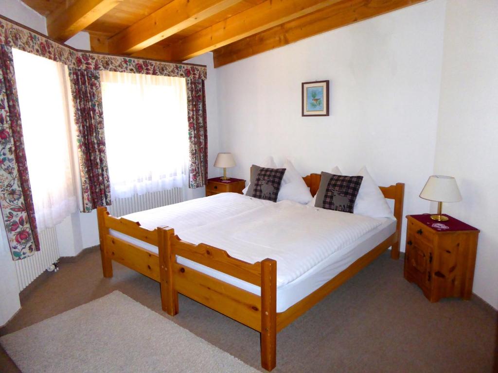 Letto o letti in una camera di Hotel Roseg-Gletscher
