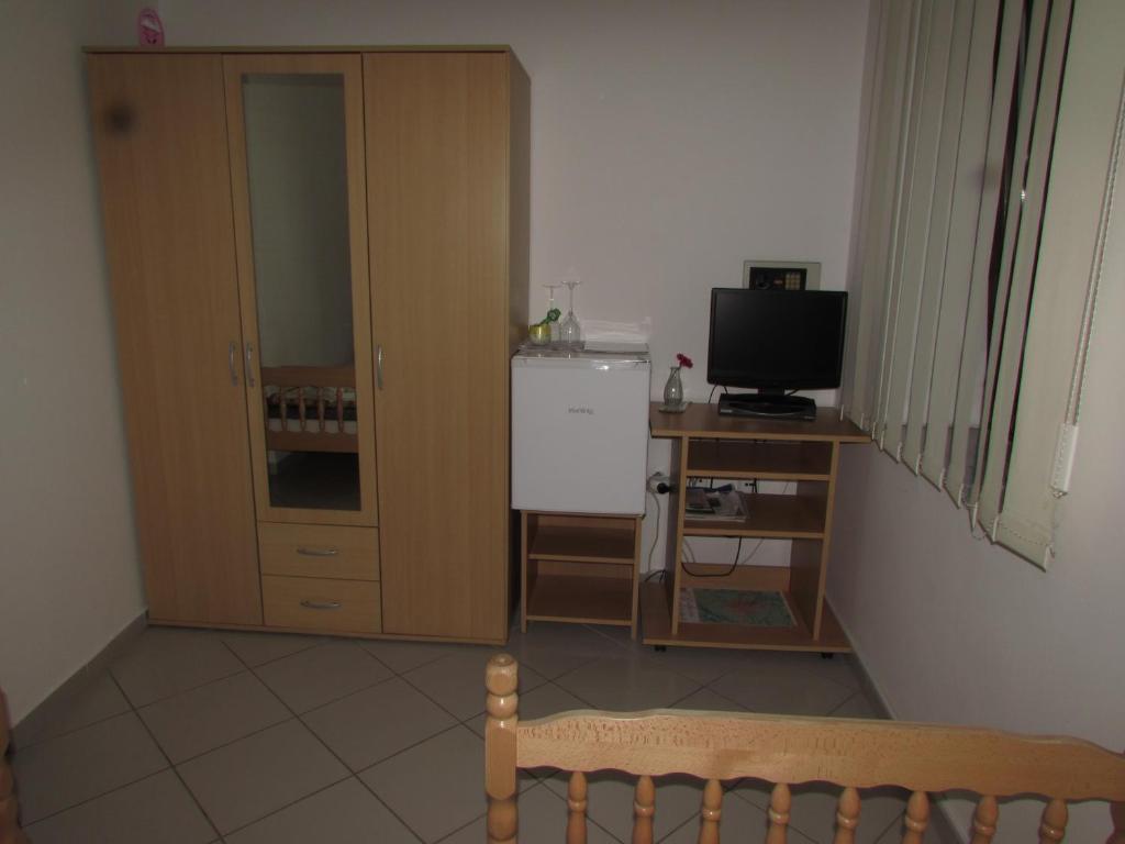 TV a/nebo společenská místnost v ubytování Rooms Vendi