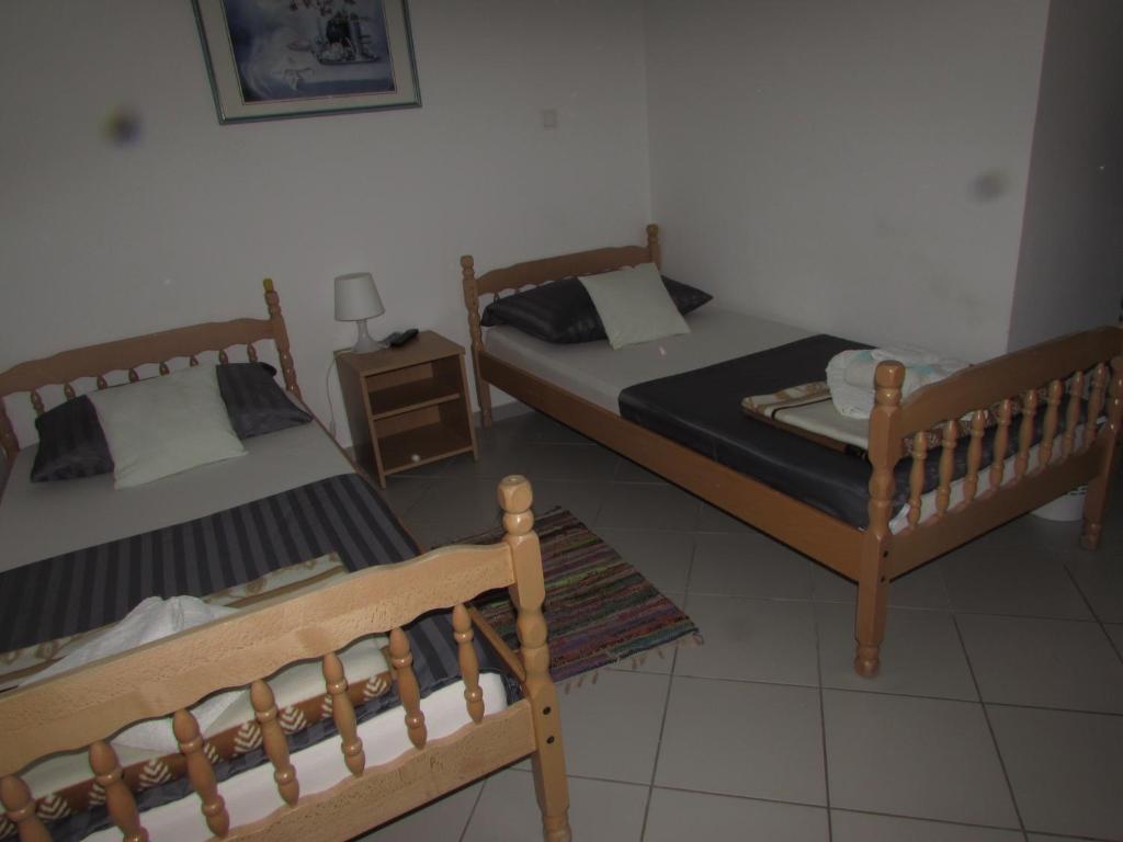 Postel nebo postele na pokoji v ubytování Rooms Vendi