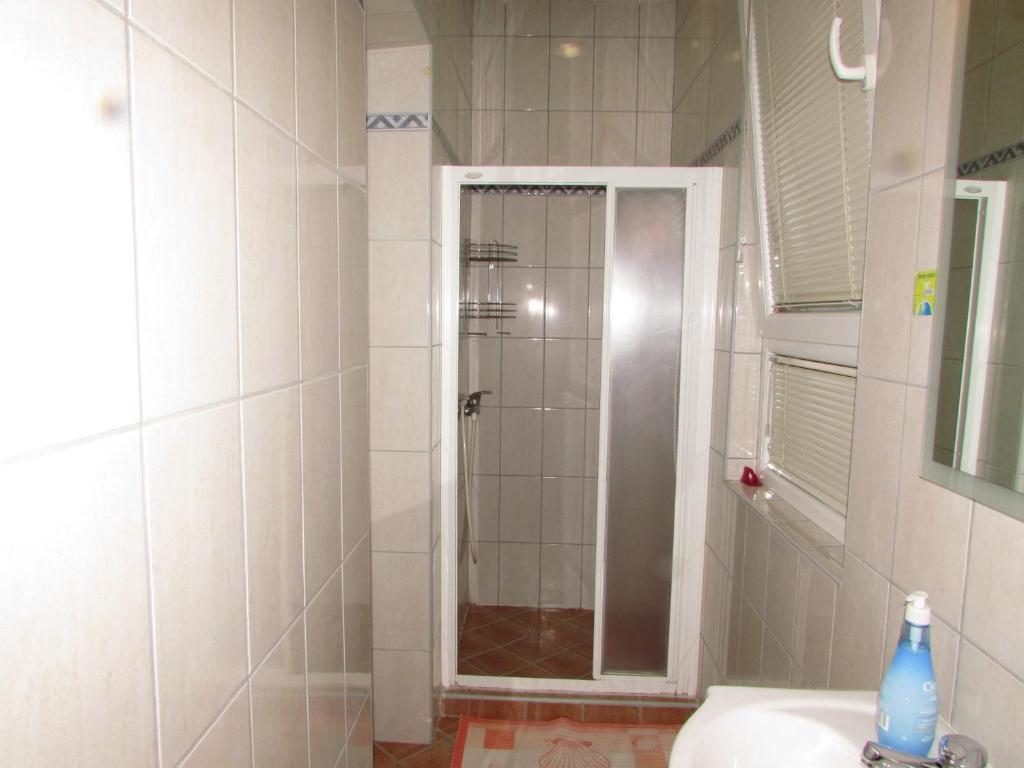 Koupelna v ubytování Rooms Vendi