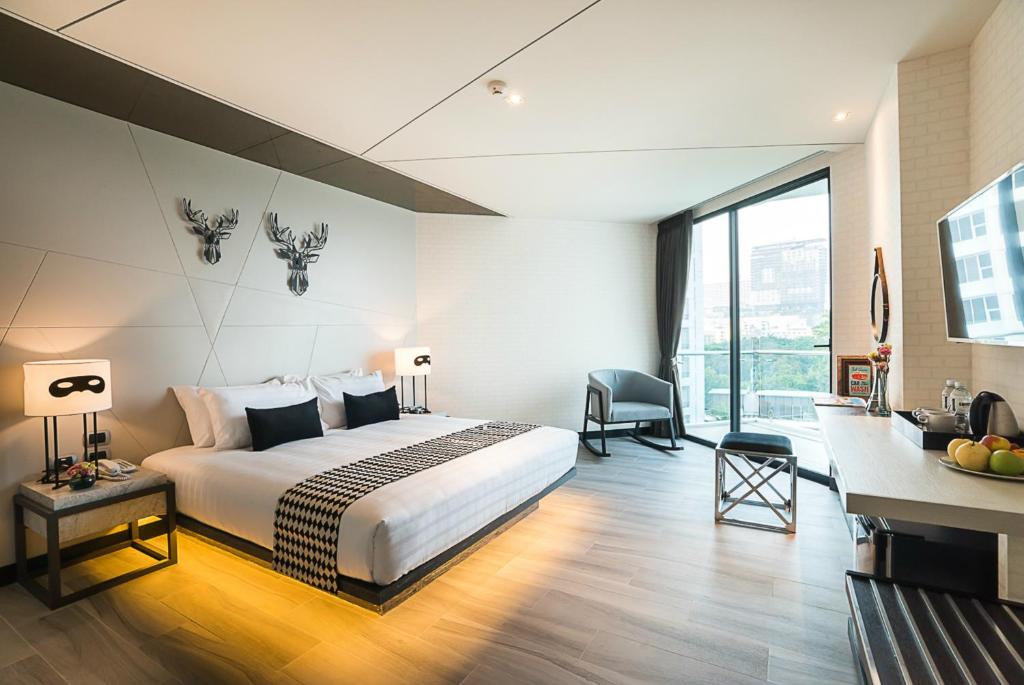 Postel nebo postele na pokoji v ubytování Mera Mare Pattaya