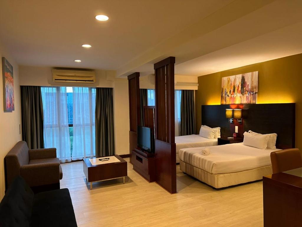 Postel nebo postele na pokoji v ubytování Am suites