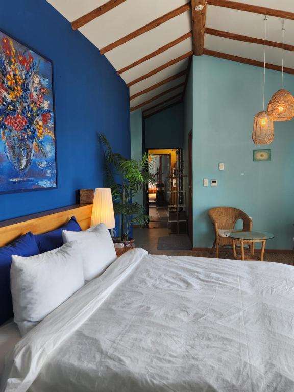 Postel nebo postele na pokoji v ubytování JEJU Doldam B&B