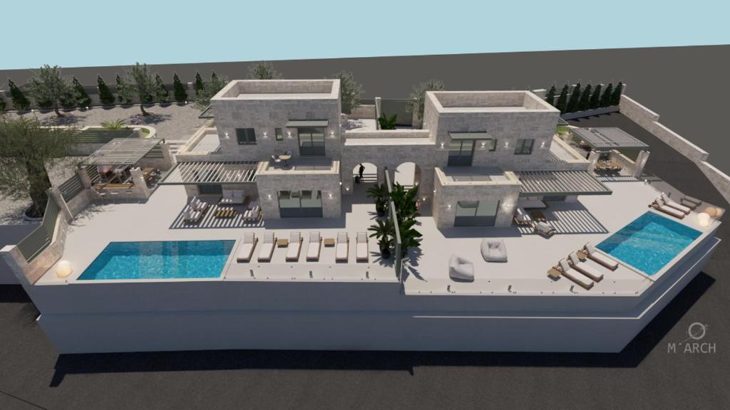Πισίνα στο ή κοντά στο Carob Luxury Villas