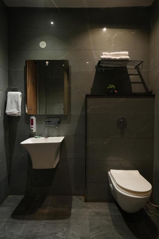 Koupelna v ubytování Hotel Kashmir inn