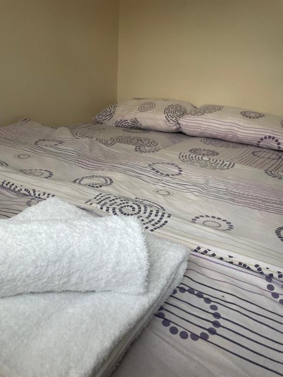 Ένα ή περισσότερα κρεβάτια σε δωμάτιο στο Apartman Lavanda