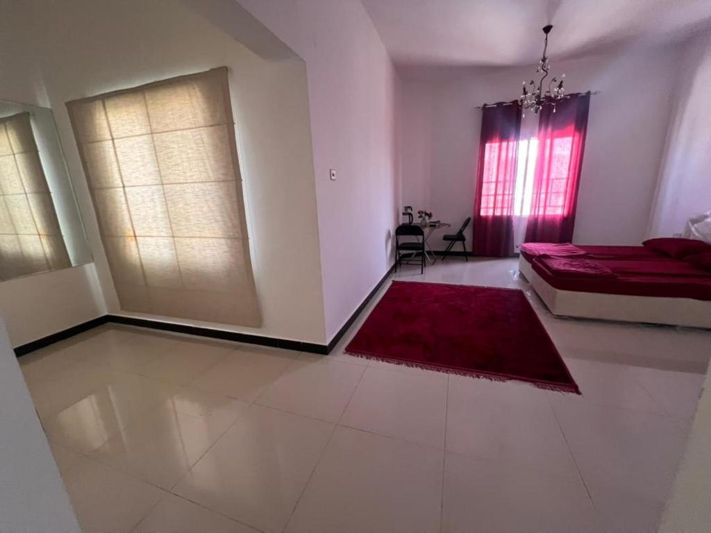 Ένα ή περισσότερα κρεβάτια σε δωμάτιο στο DrOmid