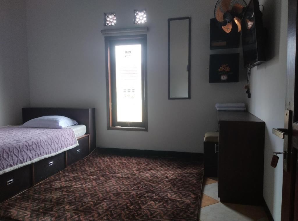 Postel nebo postele na pokoji v ubytování AN homestay2