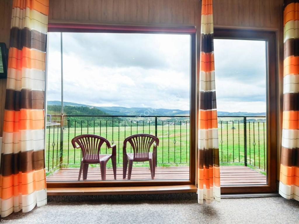 Balkón nebo terasa v ubytování GolfSPA Golfowa Wioska