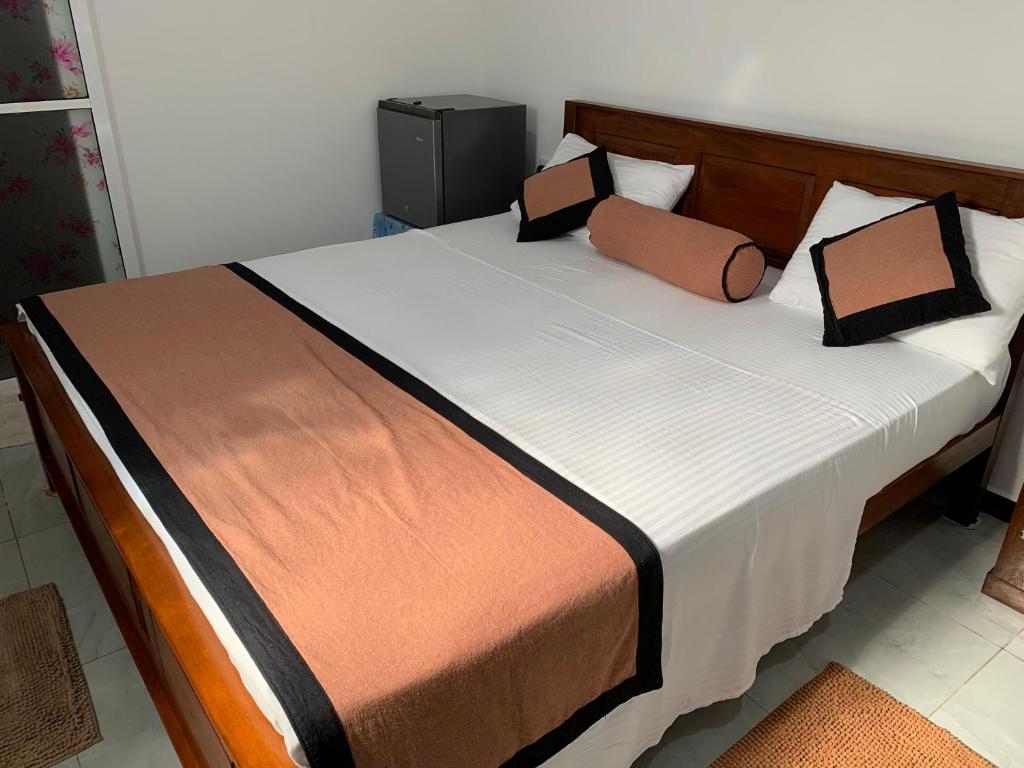 Postel nebo postele na pokoji v ubytování Turtle Residence