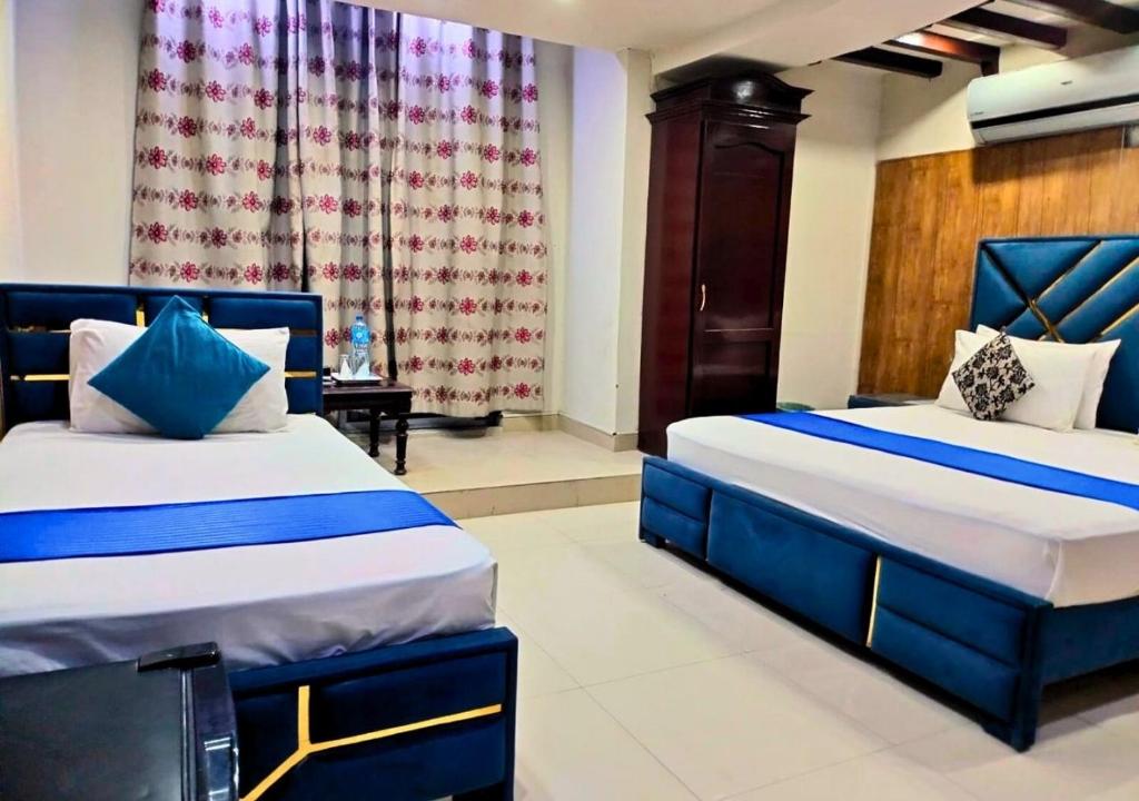 Quick continental Hotel - Jail Road - Habitación Triple De Lujo