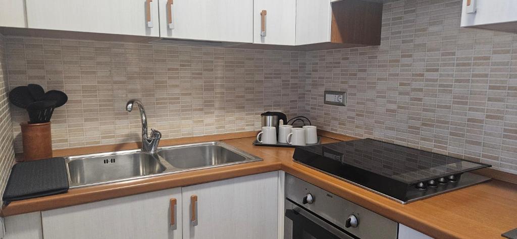 Kuchyň nebo kuchyňský kout v ubytování La Casetta