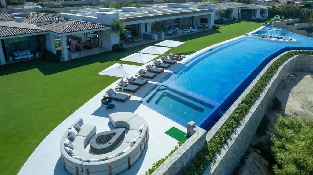 an aerial view of a house with a swimming pool at Casa Elije in San José del Cabo