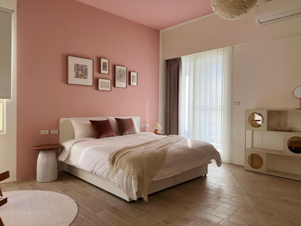 Ένα ή περισσότερα κρεβάτια σε δωμάτιο στο 靜沐森林