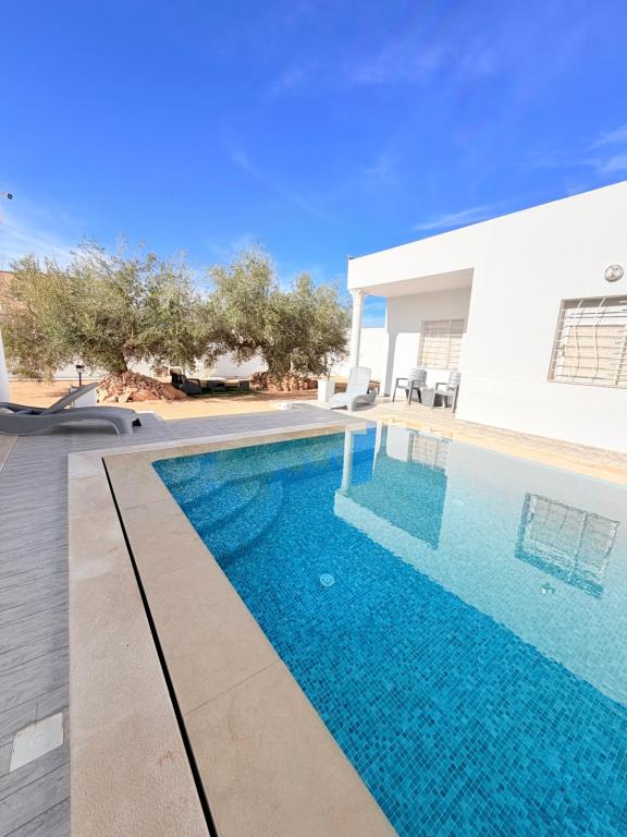 Bazén v ubytování Résidence Azur Djerba nebo v jeho okolí