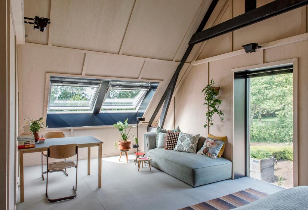 Posezení v ubytování Het Lage Noorden