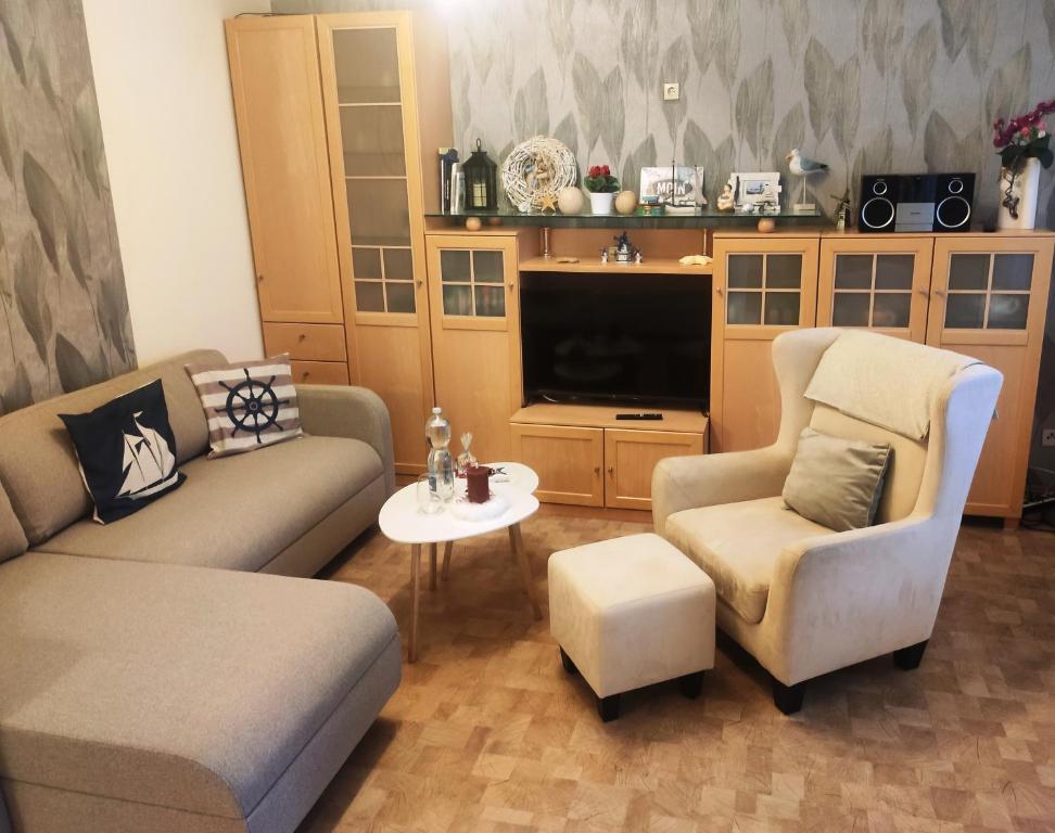 Posezení v ubytování Ferienhaus Emden Zur Mühle Nordseeküste