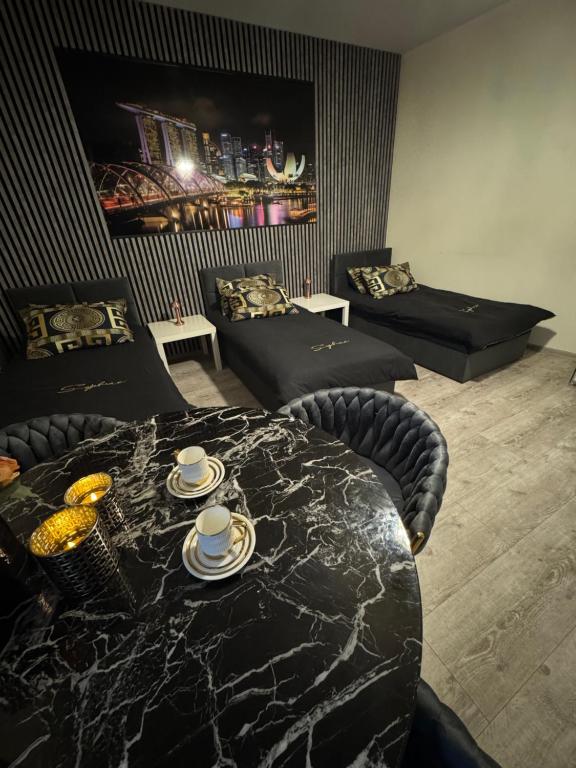 Posezení v ubytování Apartament- mieszkanie blisko centrum