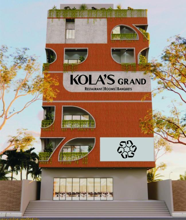 a building with a kolkata grand restaurantavidavid elements at Kolas Grand - Hotel and Convention Center in Warangal