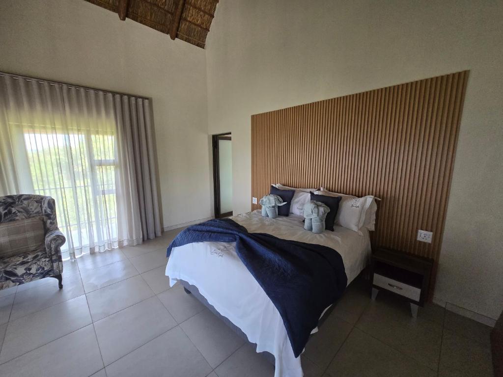 Ένα ή περισσότερα κρεβάτια σε δωμάτιο στο Bona Kgole Private Game Lodge, Mabalingwe