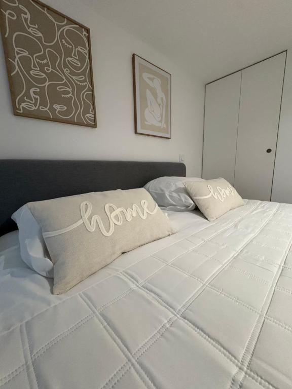 En eller flere senge i et værelse på Le Cosy de Croix-rousse