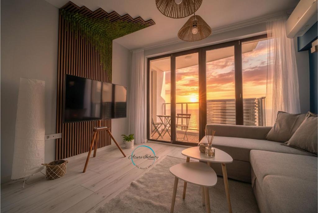 TV a/nebo společenská místnost v ubytování Azure Infinity - Sea view, Pools & SPA - Over the Sea and Under the Sky