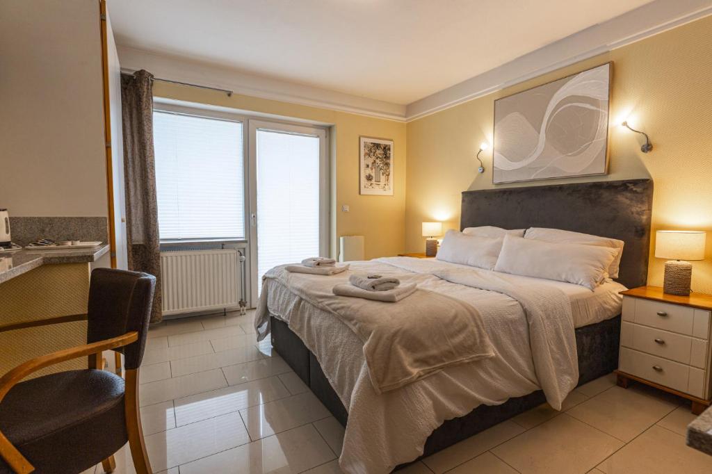 Giường trong phòng chung tại Business Pension Gasper