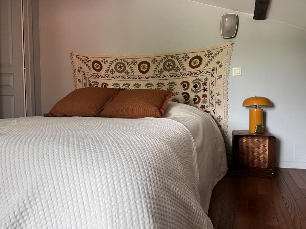 Petit mas familial ardéchoisにあるベッド