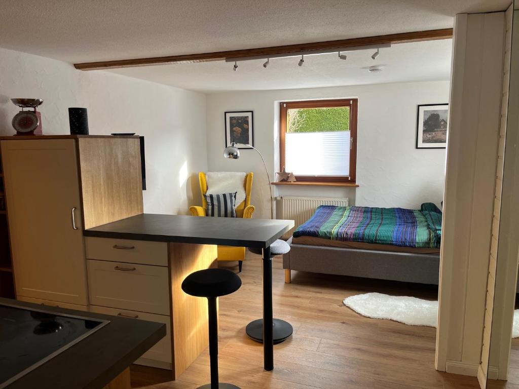 Ένα ή περισσότερα κρεβάτια σε δωμάτιο στο Schwarzwald-Nest Lenzkirch