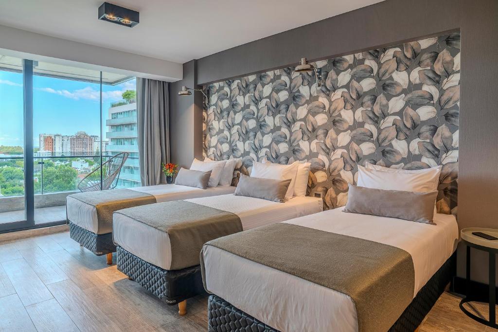 Ένα ή περισσότερα κρεβάτια σε δωμάτιο στο Casa Joseph Libertador