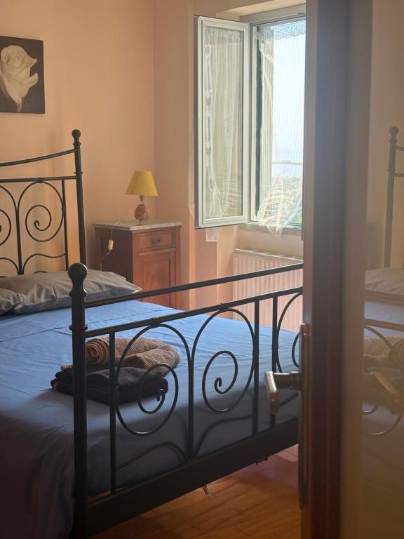 Ένα ή περισσότερα κρεβάτια σε δωμάτιο στο 4VENTI by LigurianLife