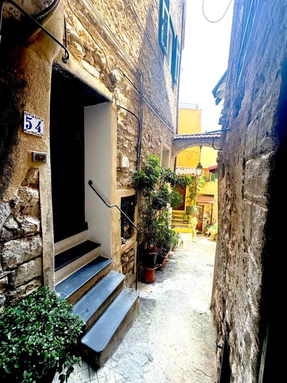 an alley with stairs leading into a building at 4VENTI by LigurianLife in Vallebona