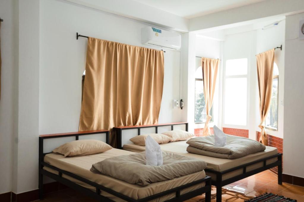 Postel nebo postele na pokoji v ubytování Orlardee hostel