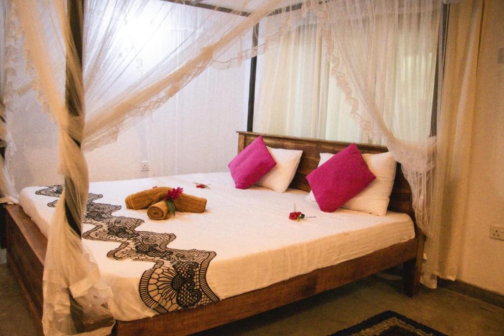 Postel nebo postele na pokoji v ubytování Peace Nest