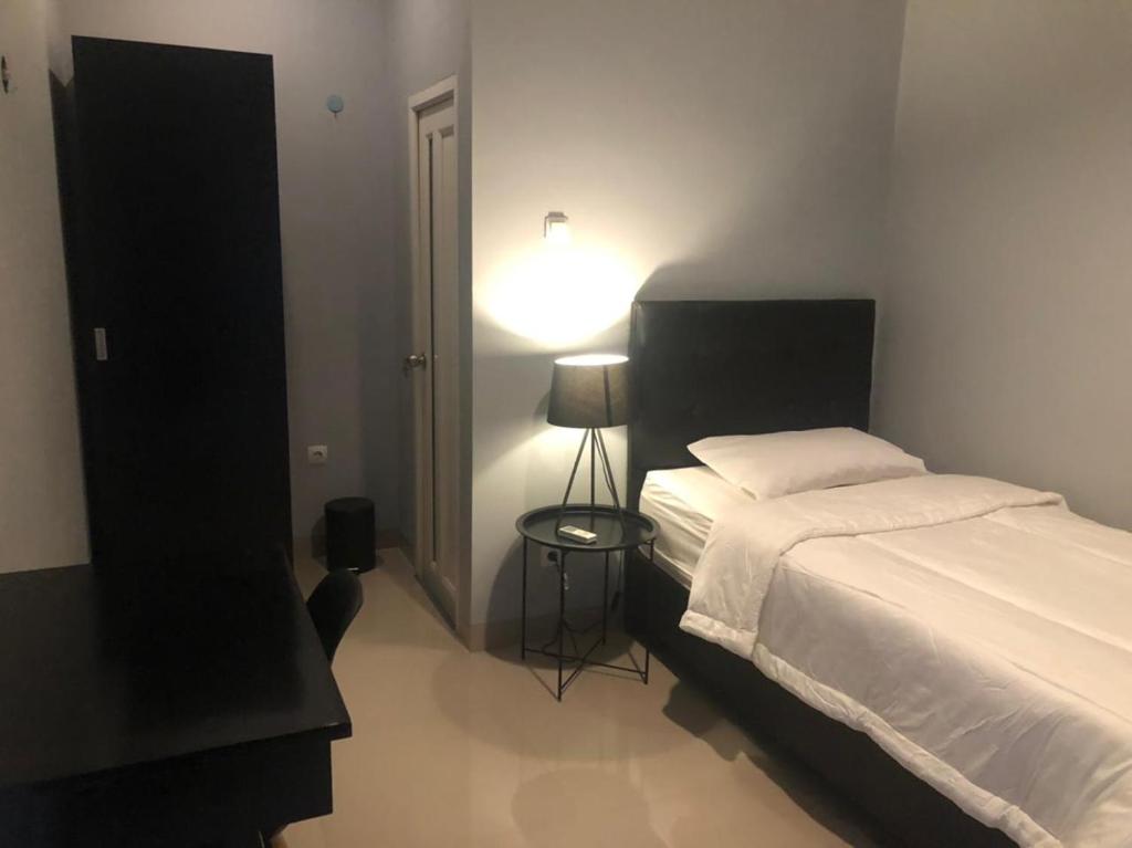 Giường trong phòng chung tại Aura Kostel