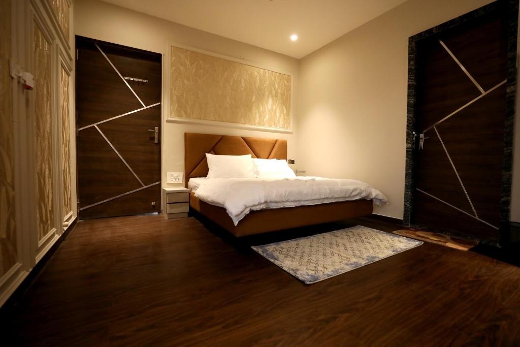 En eller flere senge i et værelse på The berhins farmstay