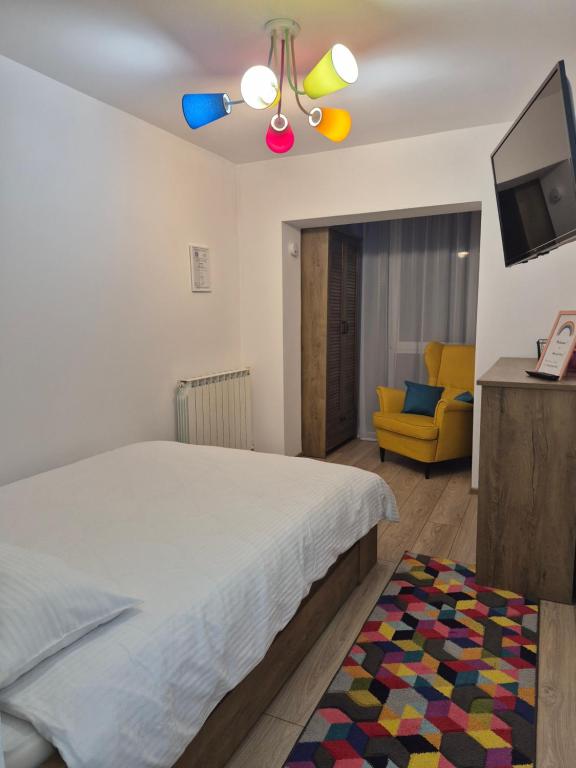 Ένα ή περισσότερα κρεβάτια σε δωμάτιο στο House of colors