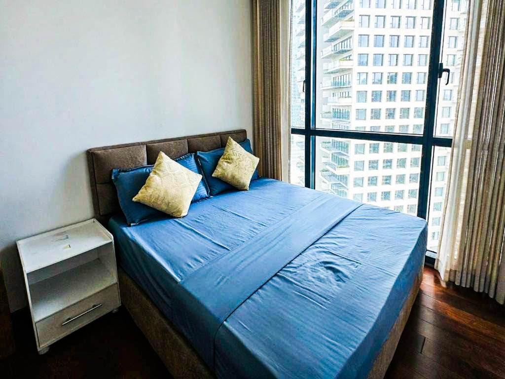 Кровать или кровати в номере city view apartment at Capitol twinpeak