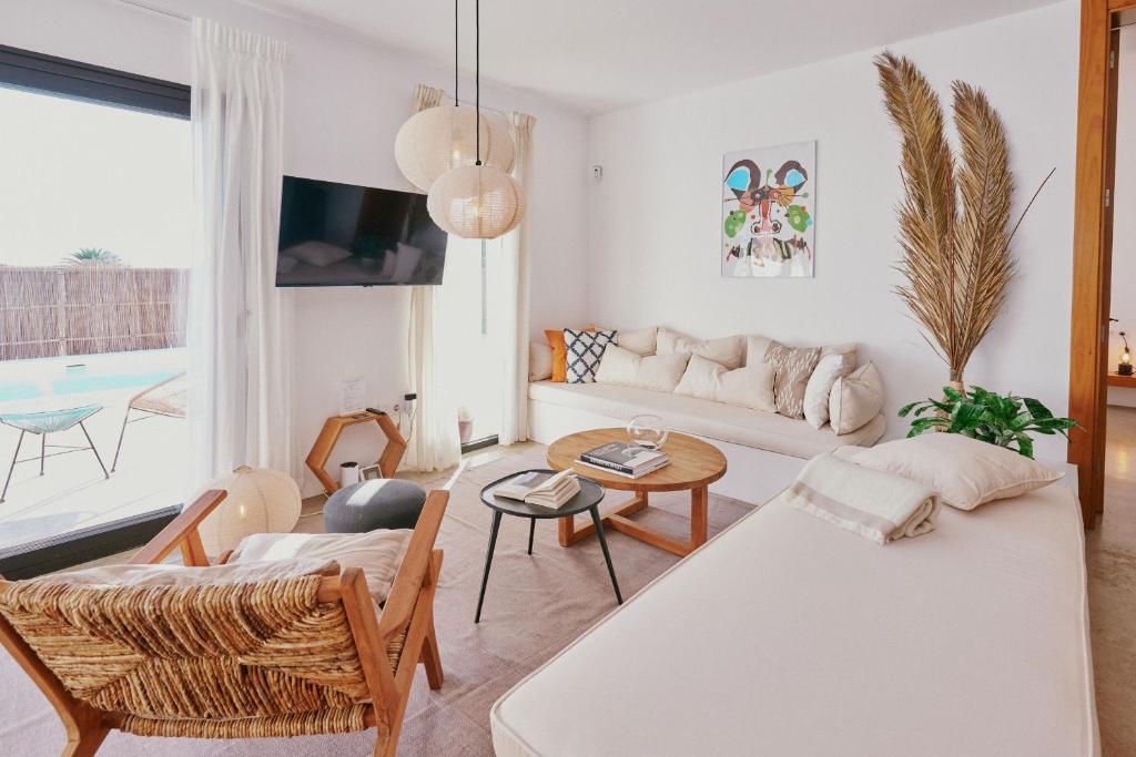 Giường trong phòng chung tại Casa del Aljibe - La Casa