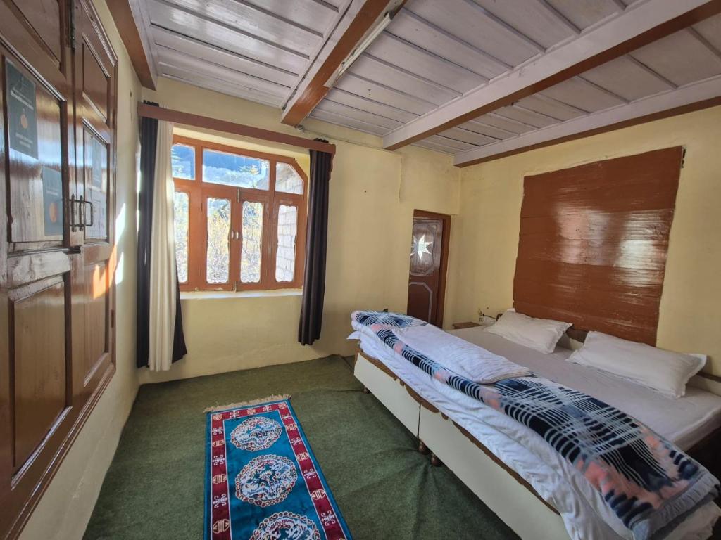 Postel nebo postele na pokoji v ubytování Rackham Stays