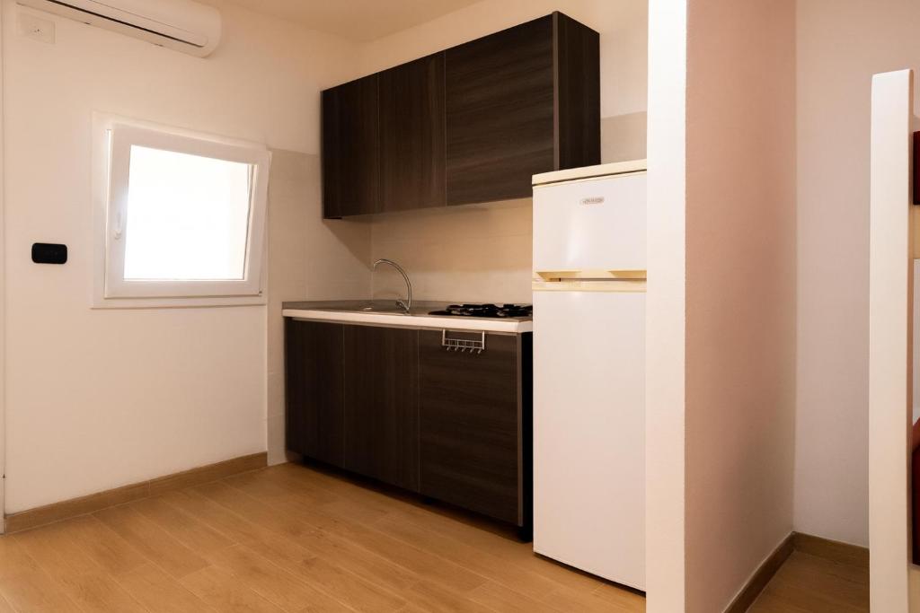 Camping Village Torrenova - Superior Bungalow