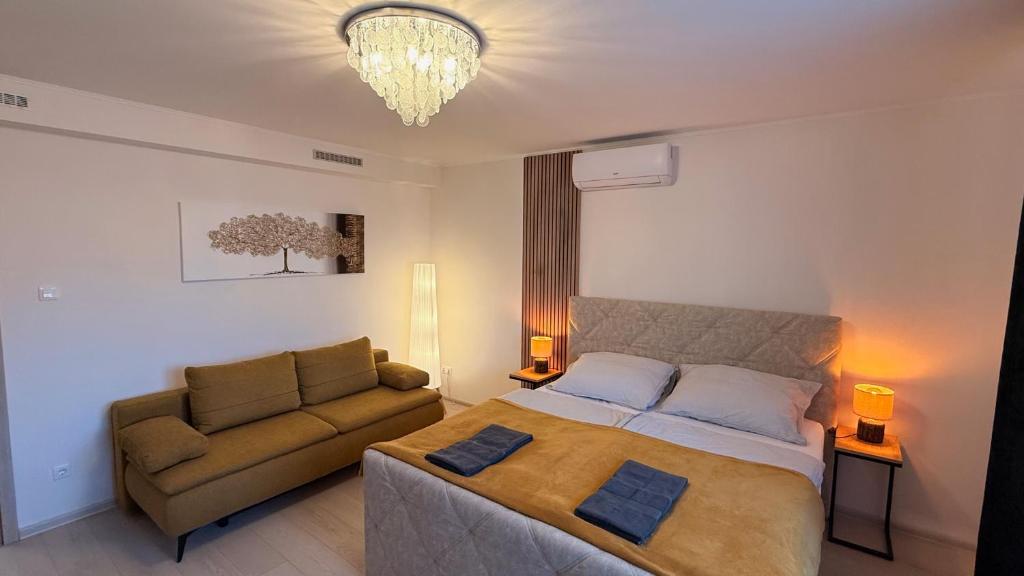 Ένα ή περισσότερα κρεβάτια σε δωμάτιο στο CasaBruno Vendégház Celldömölk