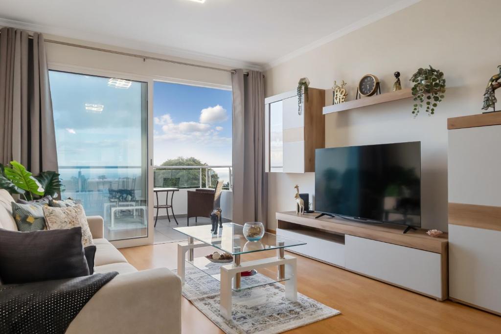 Et tv og/eller underholdning på Sunflower Stay by Homie