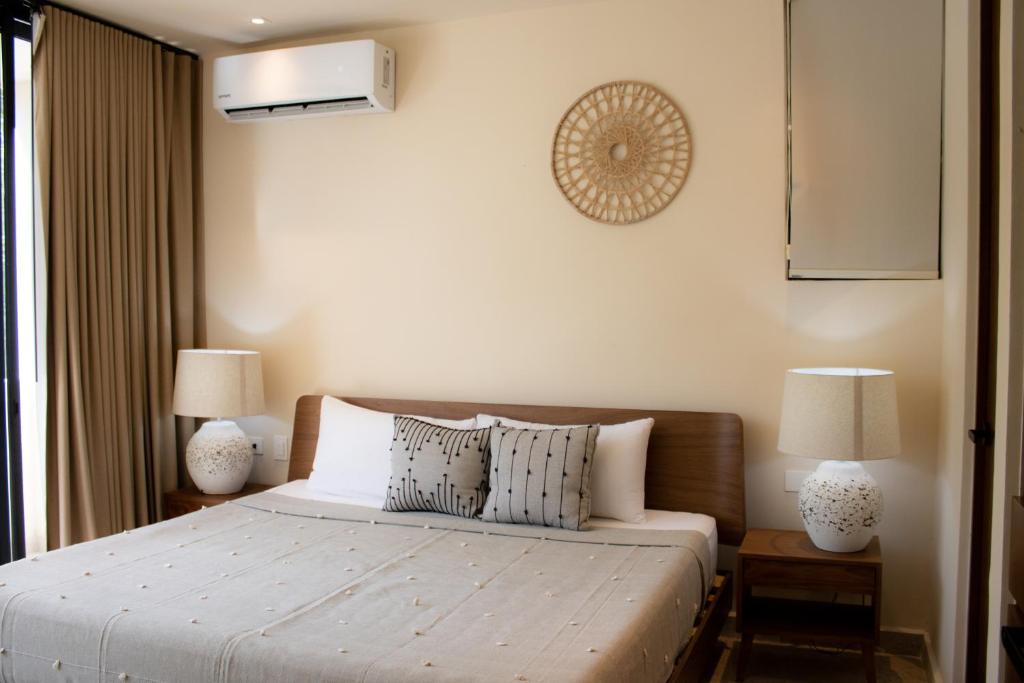 Кровать или кровати в номере Peregrina Tulum 202A 2BR Luxury Condo