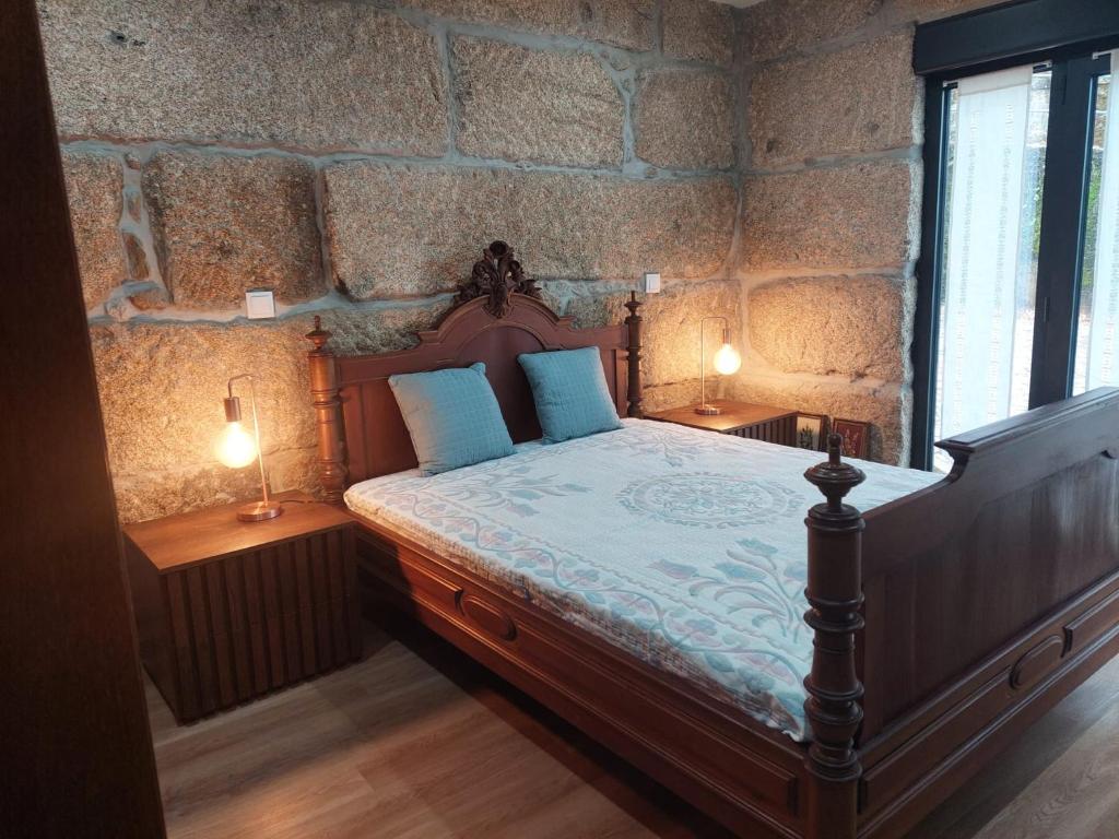 Ένα ή περισσότερα κρεβάτια σε δωμάτιο στο Casa Mucha - Rés do Chão e Andar