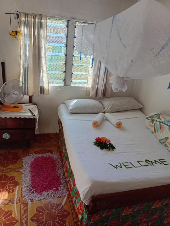 Giường trong phòng chung tại Emma's Homestay Explorer