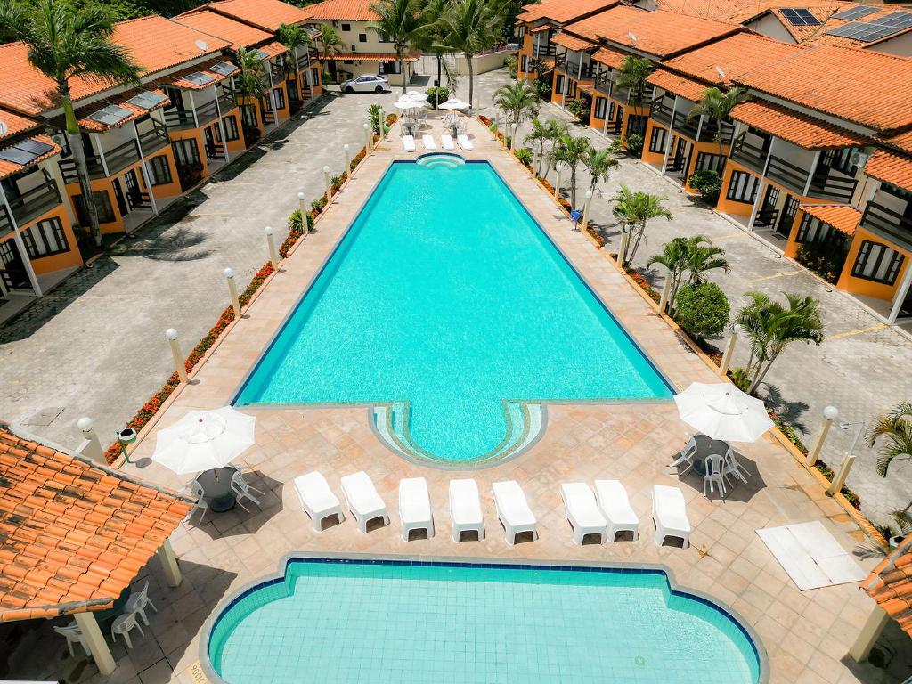 Village do Bosque - Rede Tonziro في بورتو سيغورو: منظر علوي لحوض سباحة في منتجع