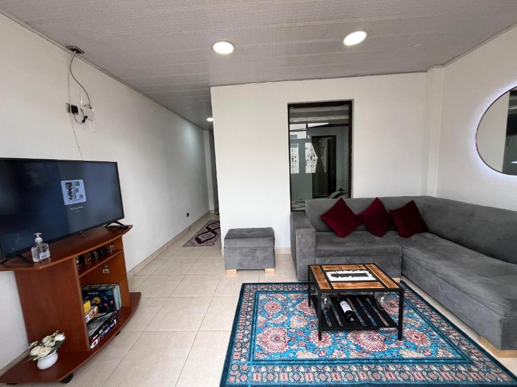 TV a/nebo společenská místnost v ubytování Guatavita Loft - Apartamento